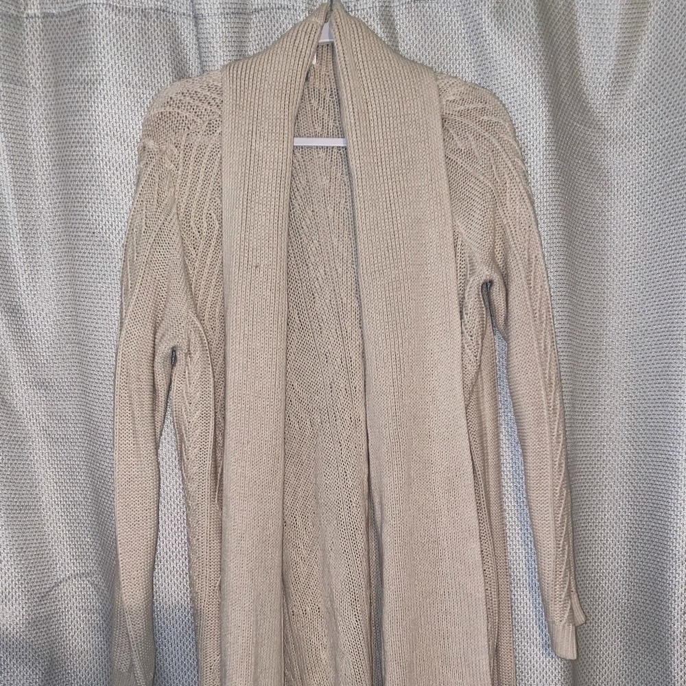 Cream colored calf-length cardigan